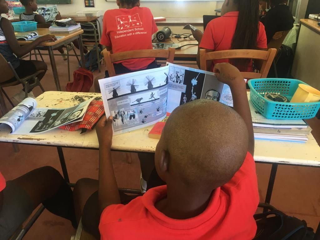 a child reading a graphic novel