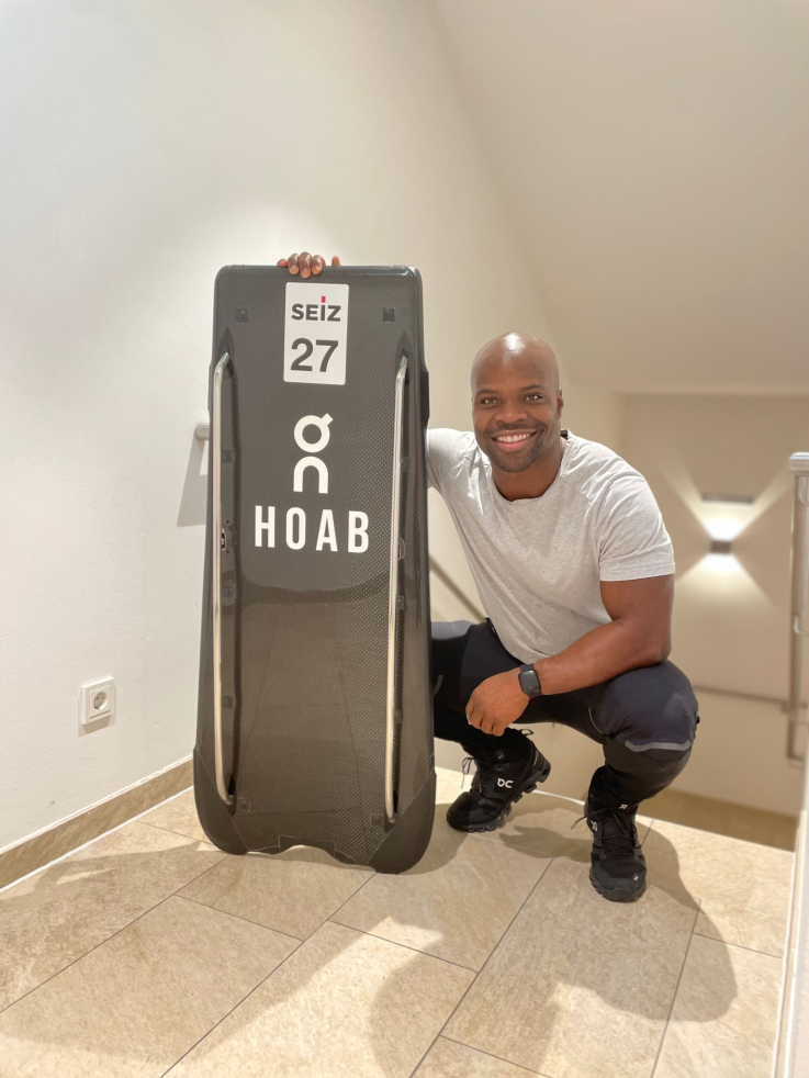 Akwasi Frimpong posing with his board